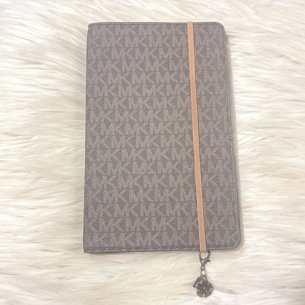 Michael Kors Brown Patterned Notebook Cover with Coach flower Charm